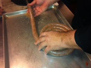Filling the hog casings with some keilbasa.